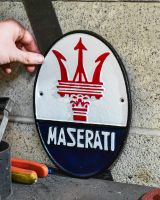 Scale image of cast iron maserati house sign Scale image of cast iron maserati house sign