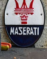 Close up of Maserati Vintage Style Cast Iron Sign finish