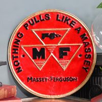 "Massey Ferguson" Cast Iron Automobilia Reproduction Sign in Situ Next to a Blue Wall "Massey Ferguson" Cast Iron Automobilia Reproduction Sign in Situ Next to a Blue Wall