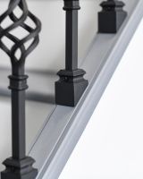 Fixed Angled Brackets on the Bottom of the Stair Spindles