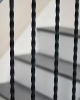 Close-Up of Matte Black "Enfield" Rope Twist Stair Spindle - Spindle ONLY - No Brackets Close-Up of Matte Black "Enfield" Rope Twist Stair Spindle - Spindle ONLY - No Brackets
