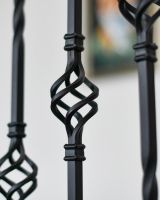 Close-up of the Matte Black Finish on the Basket of the Stair Spindle Close-up of the Matte Black Finish on the Basket of the Stair Spindle