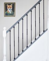 Matte Black "Enfield" Single Twist Stair Spindle in Situ in a Home