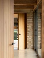 Matte Black Textured Unsprung Lever Door Handle on Art Deco Rose on Door Matte Black Textured Unsprung Lever Door Handle on Art Deco Rose on Door