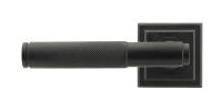 Matte Black Textured Unsprung Lever Door Handle on Square Rose Front Matte Black Textured Unsprung Lever Door Handle on Square Rose Front