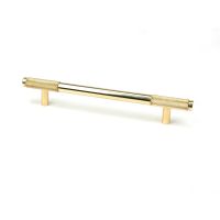 The Medium Half Knurled Cabinet Pull Handle in Polished Brass Shown Upright on a White Background