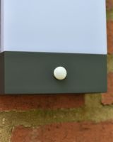 Close up of sensor detail on garden wall light
