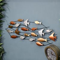 Metallic Swimming Fish Wall Art in the House