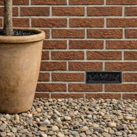 black_cast_iron_keyhole_pattern_air_brick_9_x_3_2_ installed on a new home