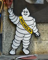 Scale image of michelin man wall sign