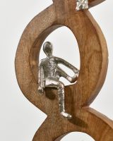 Close up of middle cast aluminium figure on home decor ornament