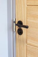 Midnight Black Hammered Unsprung Lever Door Handle on Rose in Situ