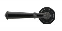 Midnight Black Unsprung Lever Door Handle on Art Deco Rose Front