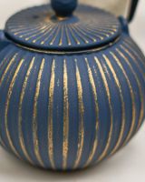 Close-Uo of Black & Gold Striped Pattern