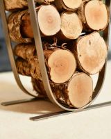 Close-Up of Minimalistic Antique Pewter Log Rack & Holder in Use