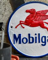 Close up of Mobilgas Vintage Style Cast Iron Sign finish