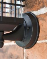 Modern caged cube wall light back plate close up