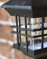 Modern caged cube wall light cage close up