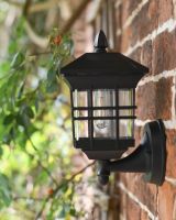 Modern caged cube wall light side view