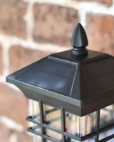 Modern caged cube wall light top close up