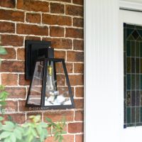 Modern Black Porch Wall Lantern Installed In Doorway Modern Black Porch Wall Lantern Installed In Doorway