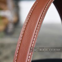 Close-up of the Leather Handle on the Top of the Ash Bucket Close-up of the Leather Handle on the Top of the Ash Bucket