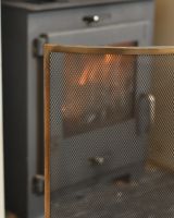 Close Up Of The Chrome Finish On The modern Fire Screen