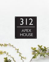 Modern Square Steel House Number Sign in Situ Mounted onto a White Wall
