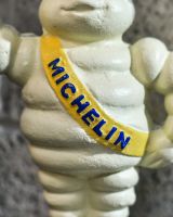 Close up of hand painted sash detail on money box