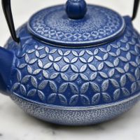 Close-Up of "Mulberry" Blue Cast Iron Teapot in Situ