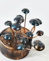 Close up of Mushroom Stump Sculpture Caps Close up of Mushroom Stump Sculpture Caps