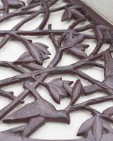 Close-Up of Natural Cast Iron Ornate "Nature in Flight" Arched Doormat