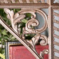 Close-up of the Ornate Design on the Natural Iron Cast Iron Shelf Bracket Close-up of the Ornate Design on the Natural Iron Cast Iron Shelf Bracket