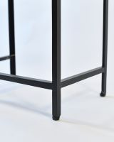 Close up of recycled iron legs on nesting tables