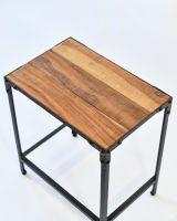 Close up o reclaimed wood top on nesting table set