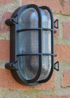 Close up of ribbed glass detailing on garden wall light