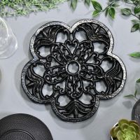 Black Cast Iron Flower Trivet in Situ Black Cast Iron Flower Trivet in Situ