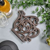 Rustic Kettle Shaped Cast Iron Trivet Angled Rustic Kettle Shaped Cast Iron Trivet Angled