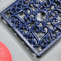 Blue Cast Iron Square Trivet Close-Up Blue Cast Iron Square Trivet Close-Up