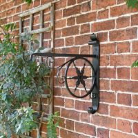 "Northern Star" Hanging Basket Bracket in Situ on a Brick Wall "Northern Star" Hanging Basket Bracket in Situ on a Brick Wall