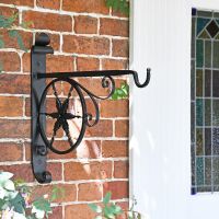 "Northern Star" Hanging Basket Bracket in Situ by a Front Door "Northern Star" Hanging Basket Bracket in Situ by a Front Door