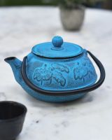 "Oketo" Lotus Flower Blue and Black Cast Iron Japanese Style Teapot side view "Oketo" Lotus Flower Blue and Black Cast Iron Japanese Style Teapot side view
