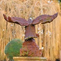 Back View of the Rustic Cast Iron Eagle Sculpture Back View of the Rustic Cast Iron Eagle Sculpture