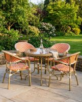 Orange Rattan Table And Chair Set digital illustration dressed table
