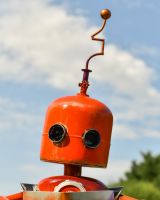 Close up of Orange Robot Head Close up of Orange Robot Head