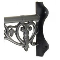 Close-up of the Ornate Scroll Work on the Corner Bracket Close-up of the Ornate Scroll Work on the Corner Bracket