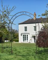 Ornate "Herb Garden" Natural Lacquer Rose Arch in situ