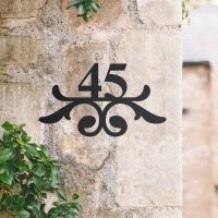 Traditional Iron Ornate Number Sign in Situ Traditional Iron Ornate Number Sign in Situ
