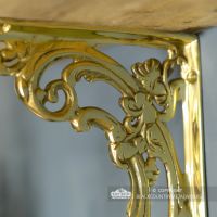 Close-up of the Ornate Scroll Bracket