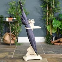 Ornate Umbrella Stand in Situ Holding an Umbrella